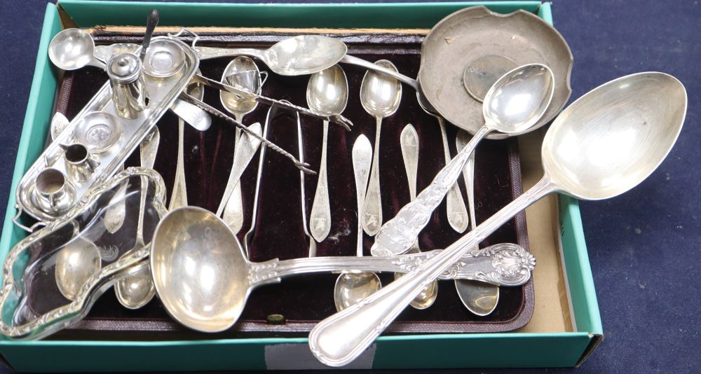 A cased set of twelve Victorian silver teaspoons with tongs, miniature tea set and flatware.
